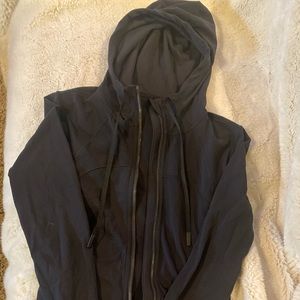 Black Lululemon zip up hoodie in soft buttery material.
